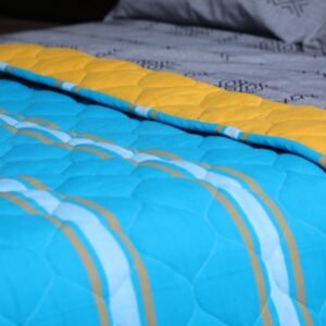 Bed Quilt - Light Blue quilt with yellow pattern